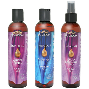 A trio of Bio-Groom's Indulge Argan Oil Line - Dog shampoo, dog conditioner, dog detangler spray.